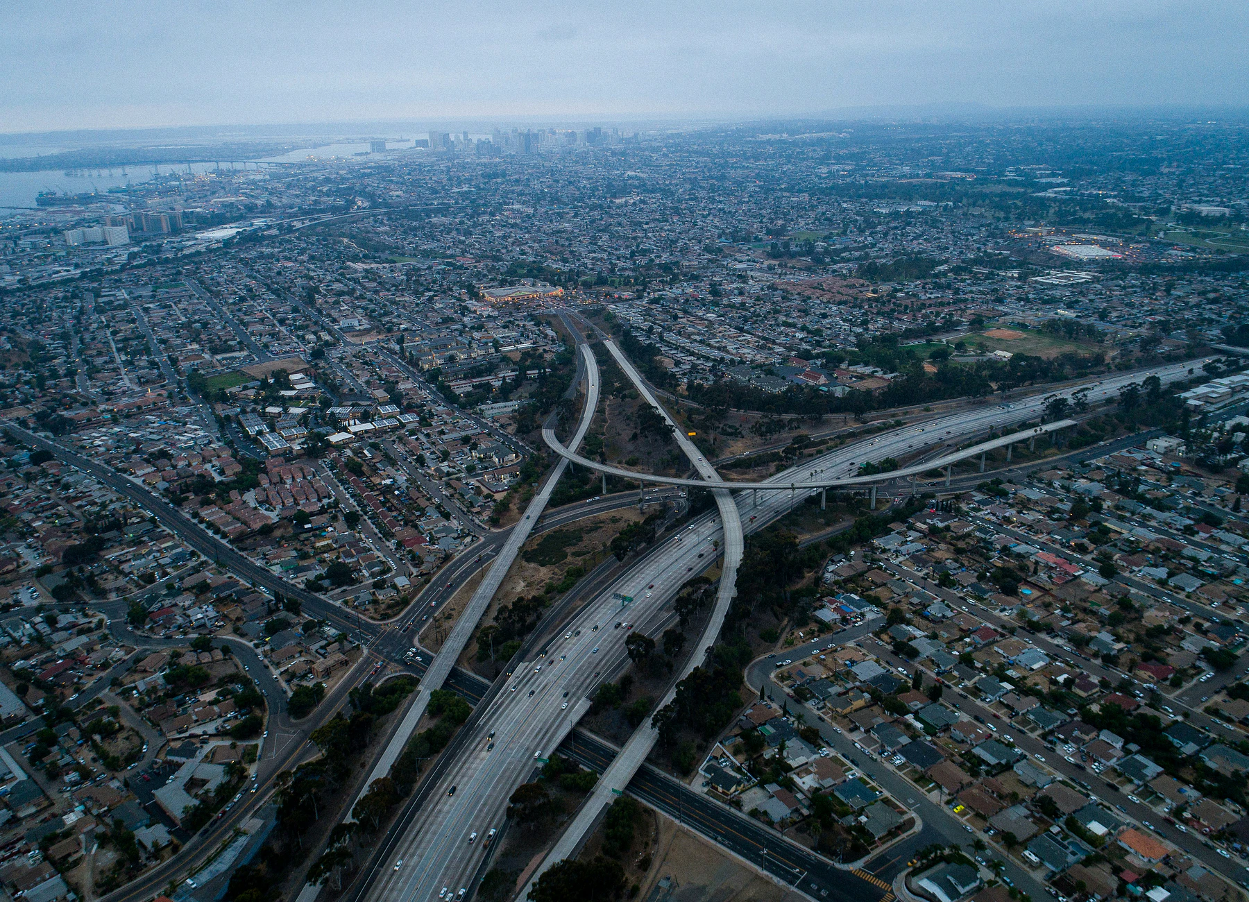 Aerial view of National City neighborhoods and downtown San Diego beyond